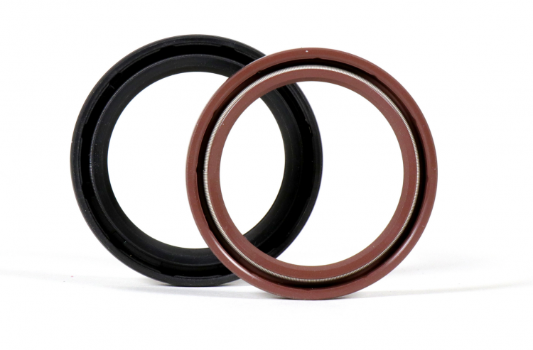Bagues d'étanchéité - 2 bagues vues de face, de même diamètre, noire et marron
